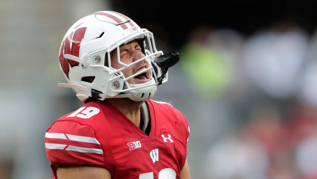Wisconsin outside linebacker Nick Herbig celebrates a sack against Washington State.